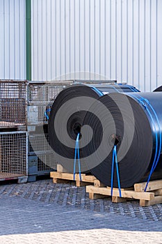 Rolls of black industrial plastic