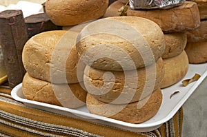 Rolls of cheese made from goat milk