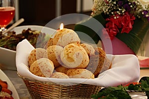 Rolls with cheese and rye bread in a basket