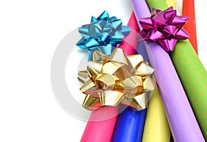 Rolls of colorful wrapping paper on white background