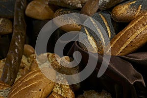 Many rolls of different breads in the bakery restaurant