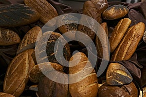 Many rolls of different breads in the bakery restaurant