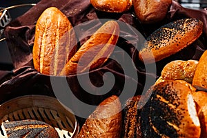 Many rolls of different breads in the bakery restaurant