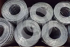 Rolls of iron grid use for reinforce concrete in construction site.. Metal mesh in rolls