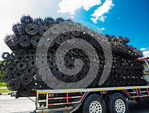 Rolls of iron mesh on truck