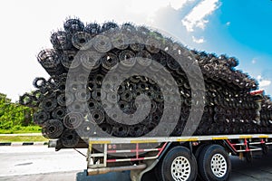 Rolls of iron mesh on truck
