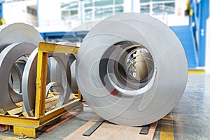 Rolls of metal sheet in factory