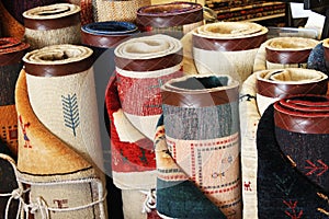 Rolls or Persian carpets