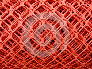 Rolls of plastic fence mesh