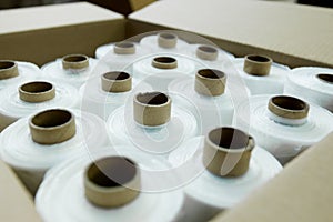 Rolls of plastic packaging film