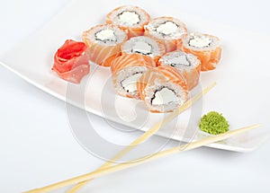 Rolls with salmon on a white