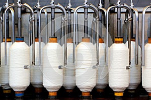 Rolls of spun cotton in a textile factory