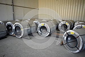 Rolls of steel sheet stored in warehouse; galvanized steel coil in the Duct Factory. Packed rolls of steel sheet, Cold rolled stee