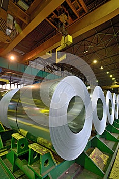 Rolls of steel sheet in warehouse