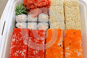 Rolls, sushi set in plastic packaging, close up