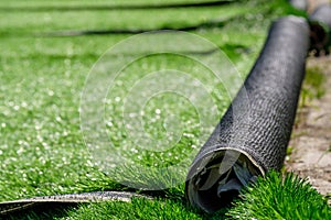 Rolls of synthetic artificial turf at the European football stadium