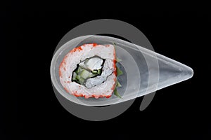 Rolls of uramaki sushi with rice nori seeweed and fish in a gourmet menu.