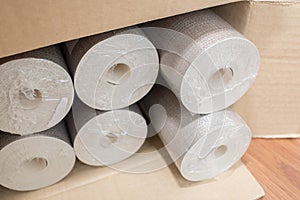 Rolls of wallpaper in the box