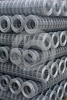 Rolls of wired metal mesh on a pallet