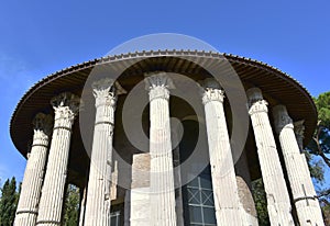 Tempio di Ercole Vincitore or Temple of Hercules Victor. Ancient Roman Greek classical style temple. Rome, Italy. photo