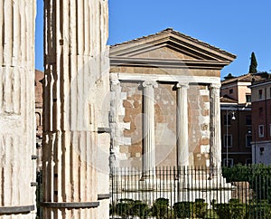 Tempio di Portuno from Tempio di Ercole Vincitore. Ancient Roman Greek classical style temples. Rome, Italy.
