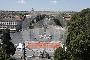 Roma, Lazio, Italy, tourists around the flaiano obelisk and people playing tennis in Piazza del Popolo