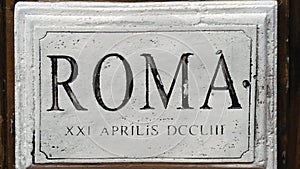 Roma writing on a marble tile in Rome, I