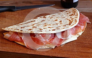 Romagna piadina with raw ham.