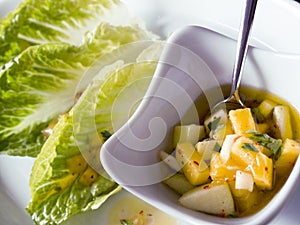 Romaine lettuce with apple mango vinaigrette