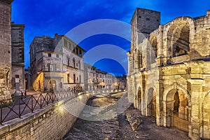 Roman amphitheatre at dusk in Arles, France