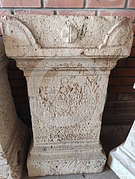Roman antique pillar with cross symbol Sremska Mitrovica Serbia photo