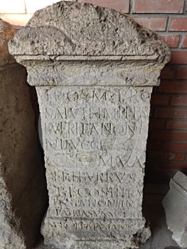 Roman antique pillar with latin text Sremska Mitrovica Serbia photo