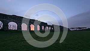 Roman aqueduct at dusk, Rome, Italy