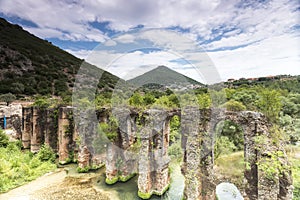 Roman aqueduct of Nikopolis against beautiful cloudy sky in Gree