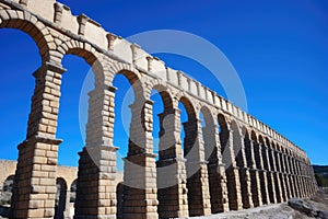 roman aqueduct, segovia, spain, under clear blue sky