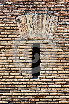 Roman brick wall with slit