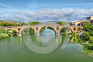 Roman bridge across the Arga river in Puente la Reina photo