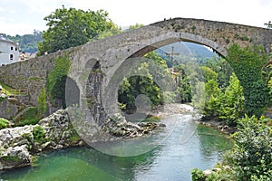 Roman bridge of Cangas de Onis in Asturias Spain photo