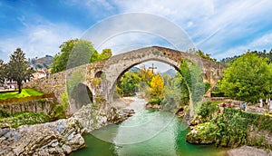 Roman bridge in Cangas de Onis, Asturias, Spain photo