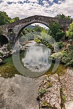 The Roman bridge of Cangas de OnÃ­s is a construction located on the Sella River as it passes through Cangas de OnÃ­s Asturias,