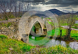 Roman bridge in Ceceda, Nava municipality, Asturias, Spain photo