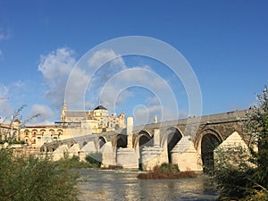 The roman bridge crossing the Guadalquivir river photo