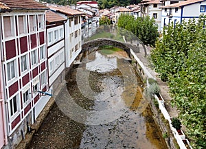 Roman bridge in the estuary of a fishing village in the Basque country called Ea, taken with a drone