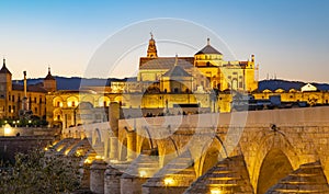 Roman Bridge and Mosque Cathedral of Cordoba, Spain photo