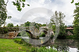 Roman bridge over the Arnoia river in Allariz, Ourense photo