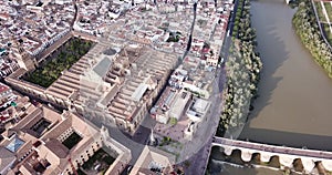 Roman Bridge over the Guadalquivir from aerial panoramic view with Mosque-Cathedral in Cordoba