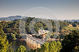 Roman bridge over the Minho River in Portomarin photo