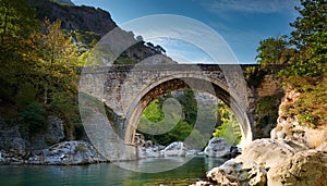 Roman bridge over a mountain stream, AI generated