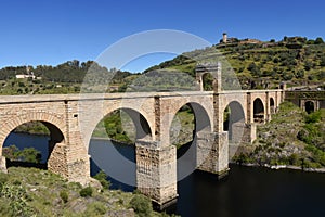 Roman bridge over the Tajo river in Alcantara,