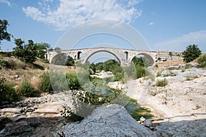 Roman bridge Pont Julien in Luberon in Provence, France